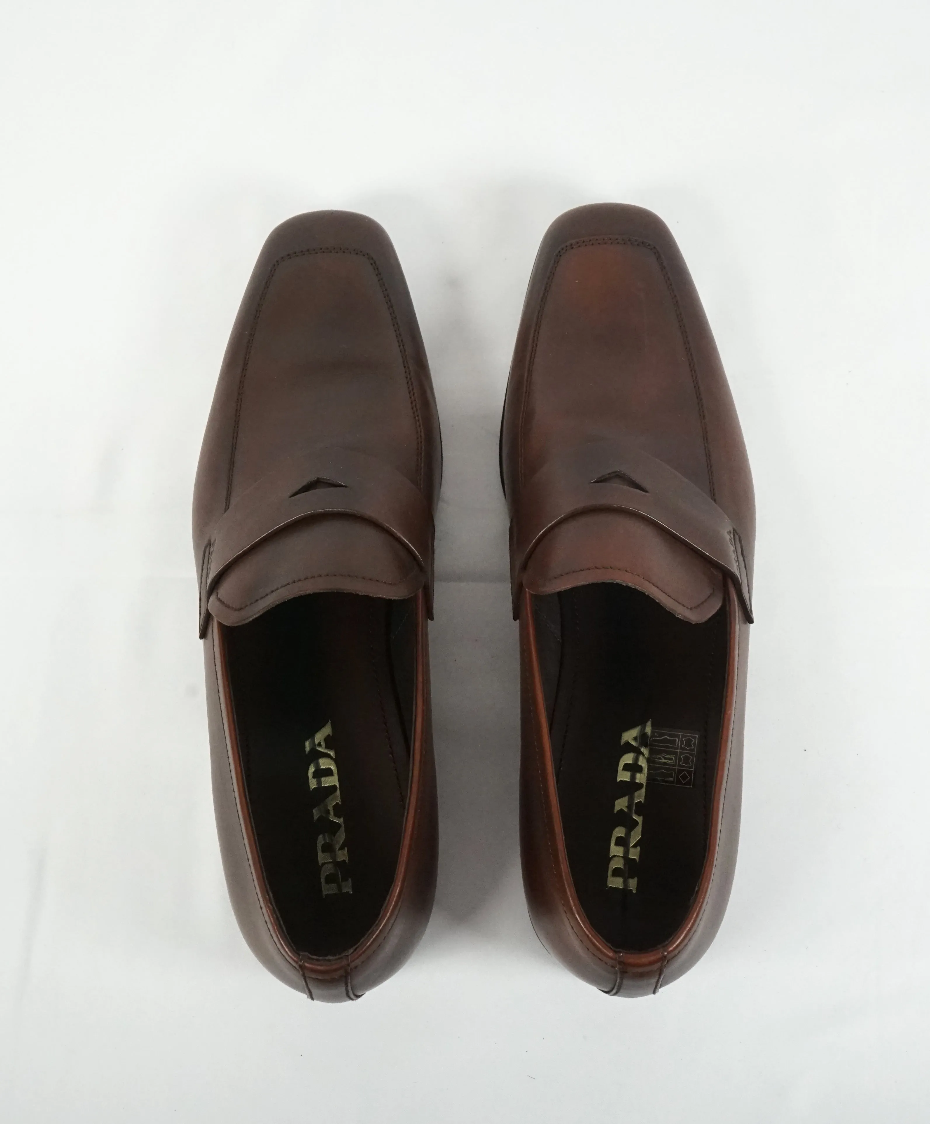 PRADA - Asymmetrical Leather Logo Penny Loafers Brown - 8.5