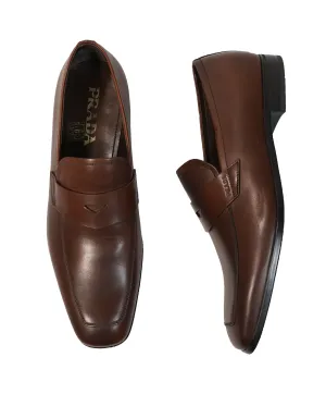 PRADA - Asymmetrical Logo Penny Loafers Brown - 8US