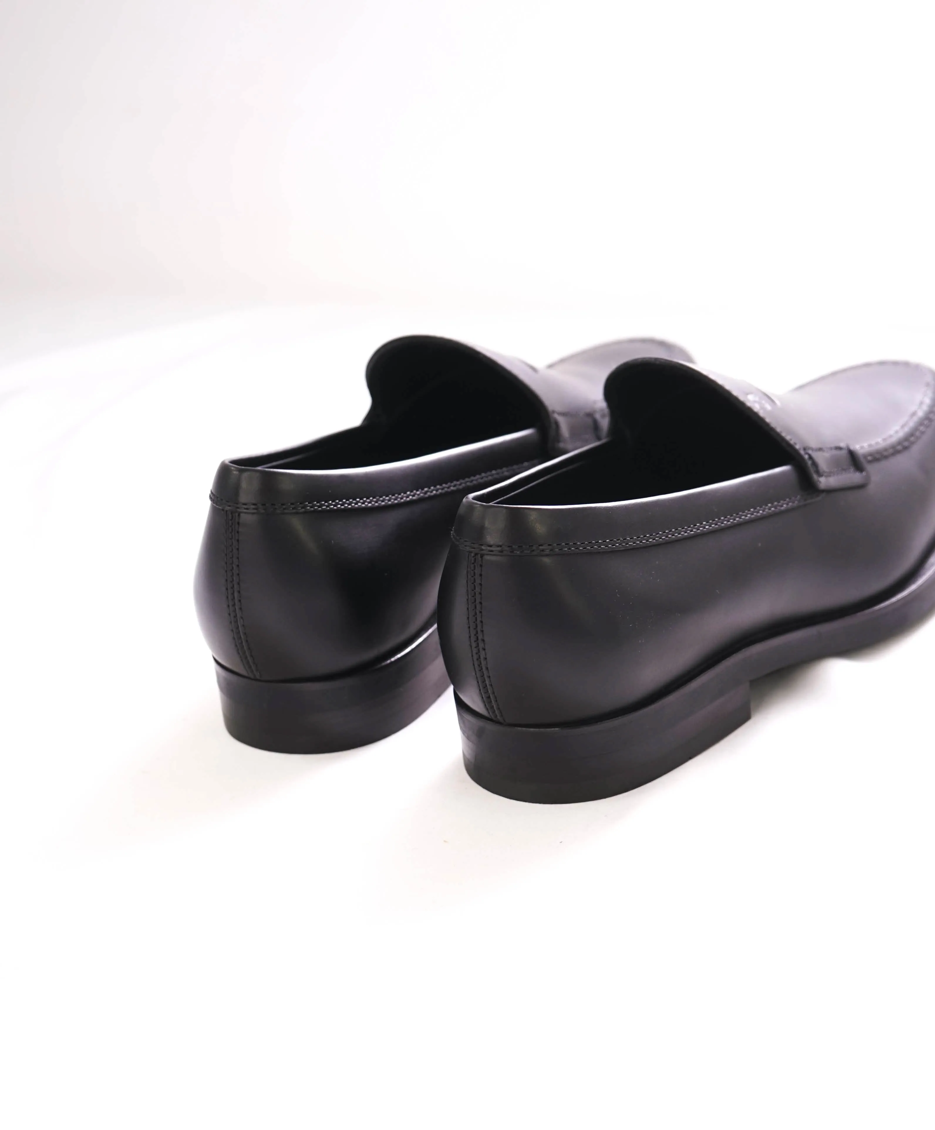 TOD’S - “Boston” Black Logo Embossed Vamp Penny Loafers - 7.5 US