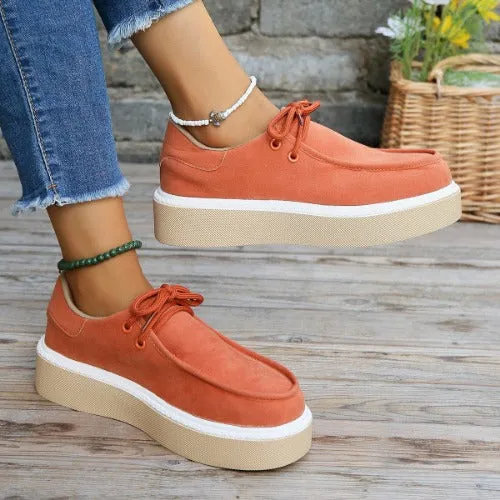 Women's lace-up sneakers with a thick sole